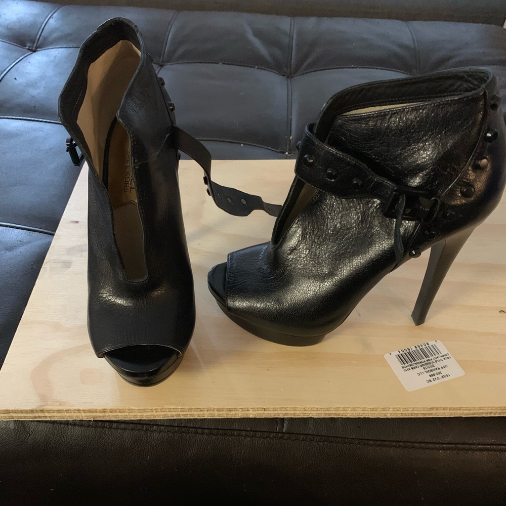 Michael Kors has peep-toe booties